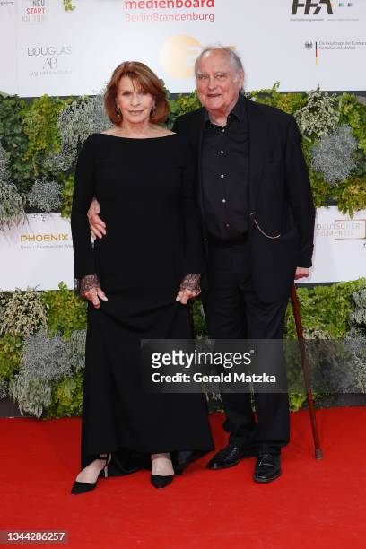 Senta Berger and Michael Verhoeven arrive for the Lola - German Film Award at Palais am Funkturm on October 01, 2021 in Berlin, Germany.