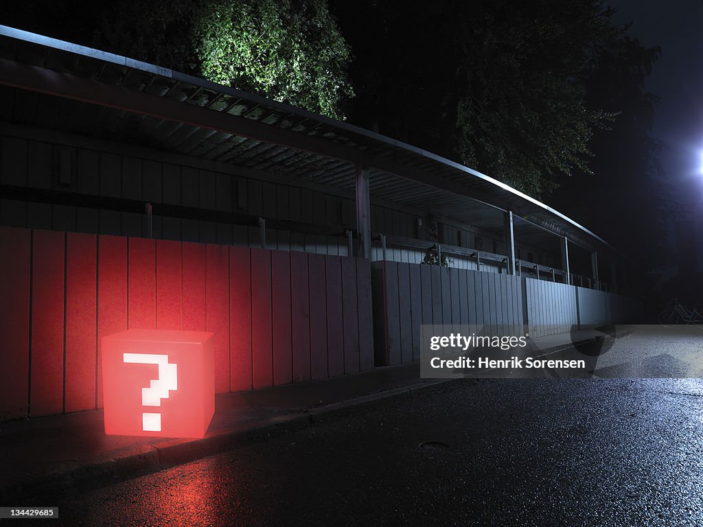 Red box with question mark in the street