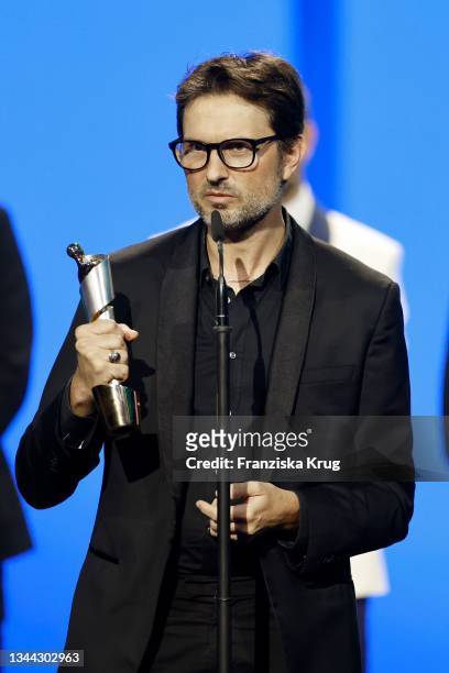 Simon Verhoeven with the ‘Besucherstärkster Film’ award for ‘Nightlife’ on stage during the Lola - German Film Award at Palais am Funkturm on October...