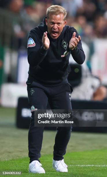 Markus Anfang, head coach of Bremen celebrates during the Second Bundesliga match between SV Werder Bremen and 1. FC Heidenheim 1846 at Wohninvest...