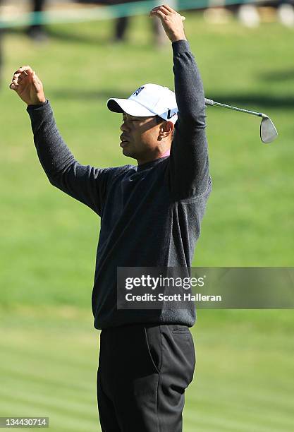 Tiger Woods reacts to a shot on the seventh hole during the first round of the Chevron World Challenge at Sherwood Country Club on December 1, 2011...