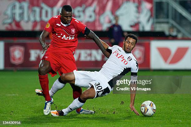 Douglas of FC Twente and Moussa Dembele of Fulham compete during the Europa League match between FC Twente and Fulham FC at the Grolsch Veste,...