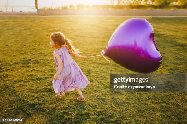 Balloon Running 94 Helium Ballon Run Stock Photos, High-Res Pictures, and Images ...