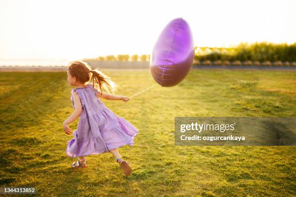 Balloon Running 94 Helium Ballon Run Stock Photos, High-Res Pictures, and Images ...
