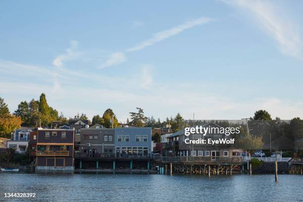 rear view of historic storefronts in coupeville, whidbey island, washington overlooking penn cove, puget sound - whidbey island bildbanksfoton och bilder