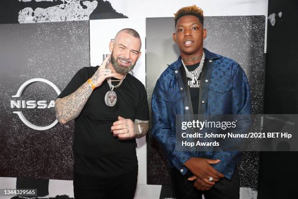 Paul Wall and Yung Bleu attend the 2021 BET Hip Hop Awards at Cobb Energy Performing Arts Center on October 01, 2021 in Atlanta, Georgia.