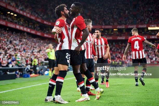 Raul Garcia of Athletic Club celebrates with his teammate Inaki Williams of Athletic Club after scoring the opening goal during the Laliga Santander...