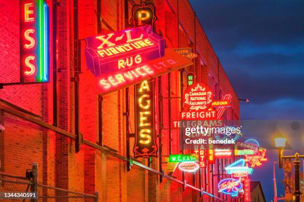 neon sign museum edmonton alberta canada night - edmonton stock pictures, royalty-free photos & images