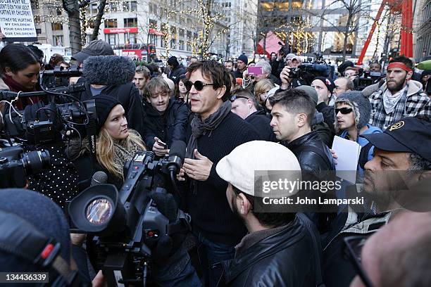 Stephan Jenkins of The Thire Eye Blind performs at Zuccotti Park during Occupy Wall Street on December 1, 2011 in New York City.