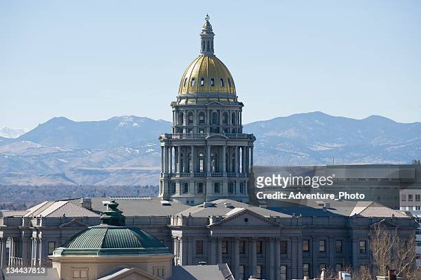 denver state capitol building with mountain view - colorado capitol stock pictures, royalty-free photos & images