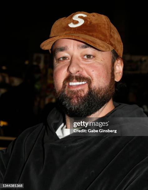 Austin "Chumlee" Russell from History's "Pawn Stars" television series plays in a Pokemon tournament in the My 4 Sons booth during Unicon 2021 at the...