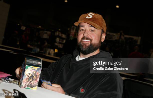 Austin "Chumlee" Russell from History's "Pawn Stars" television series plays in a Pokemon tournament in the My 4 Sons booth during Unicon 2021 at the...