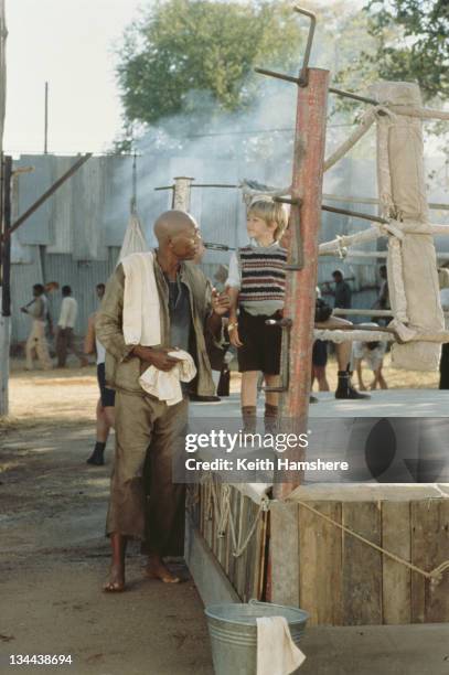 Child actor Guy Witcher as the 7-year-old P.K. And American actor Morgan Freeman as Geel Piet, his boxing mentor, in the film 'The Power of One',...