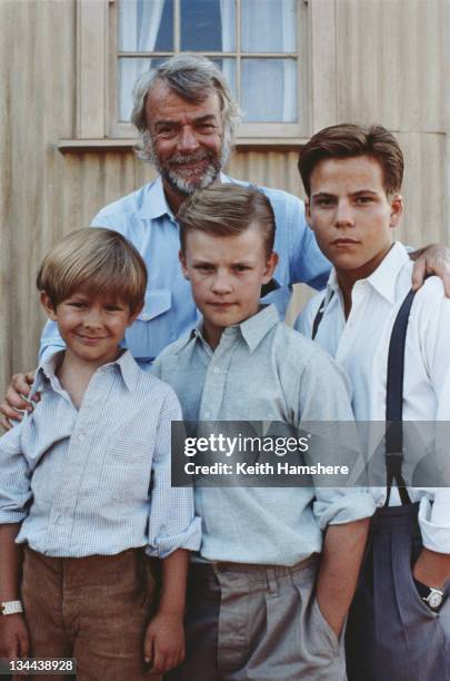 American director John G. Avildsen with the three actors who portray the protagonist P.K. At different ages, in the film 'The Power of One', 1992....