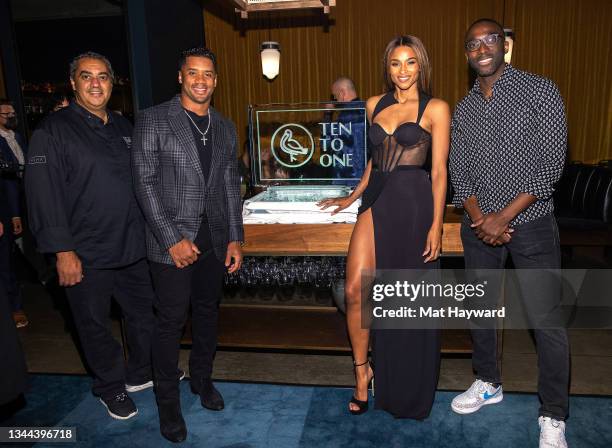 Chef Michael Mina, Seattle Seahawks quarterback Russell Wilson, Singer and business woman Ciara and Ten To One founder Marc Farrell pose for a photo...