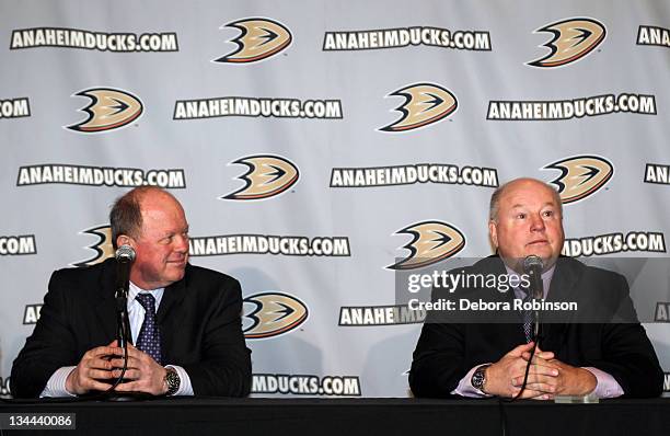 General Manager Bob Murray looks on as newly announced head coach Bruce Boudreau addresses the media after practice at Anaheim Ice on December 1,...