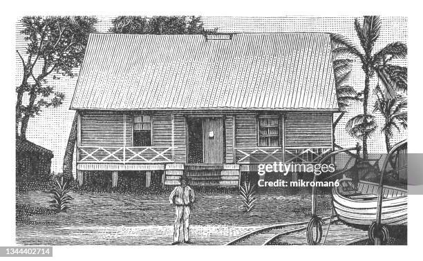 old illustration of station building, village house in mioko island, bismarck archipelago (mussau island, papua new guinea) - west papua stock pictures, royalty-free photos & images