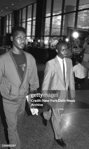 Antron McCray walking into court during Central Park jogger rape trial.