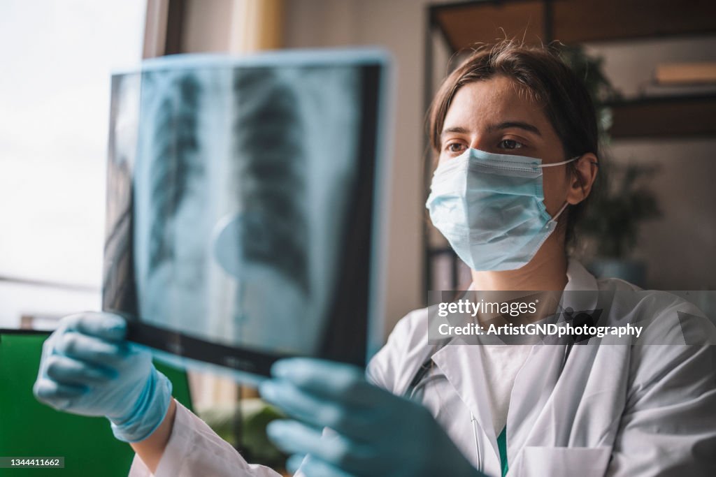Doctor Analyzing Pulmonary X-Ray Picture