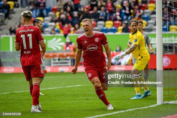 Rouwen Hennings of Duesseldorf celebrates after scoring his team´s first goal during the Second Bundesliga match between Fortuna Düsseldorf and SC...
