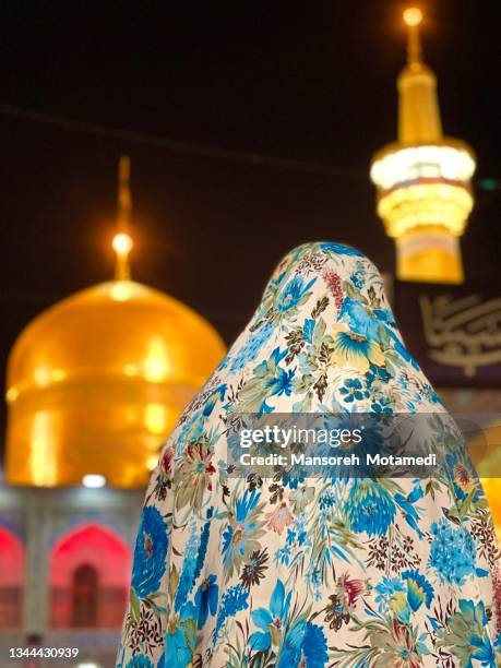 people praying haram complex and the imam reza shrine in mashad iran - shi'ite islam stock pictures, royalty-free photos & images