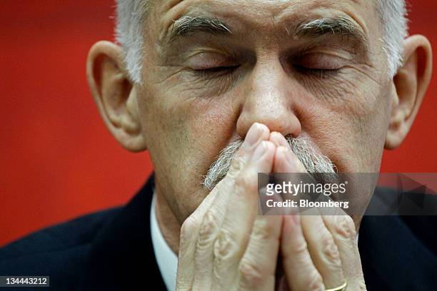 George Papandreou, Greece's prime minister, reacts during an interview at his office in Athens, Greece, on Tuesday, July 19, 2011. "It could be a...
