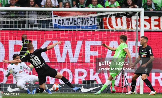 Luca Waldschmidt of Wolfsburg scores his team's first goal during the Bundesliga match between VfL Wolfsburg and Borussia Mönchengladbach at...