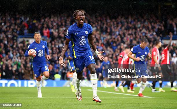 Trevoh Chalobah of Chelsea celebrates after scoring their side's first goal during the Premier League match between Chelsea and Southampton at...