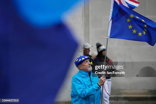 Man holds a European Union flag as the group, Manchester for Europe hold a Brexit isn't Working protest ahead of the Conservative Party Conference on...