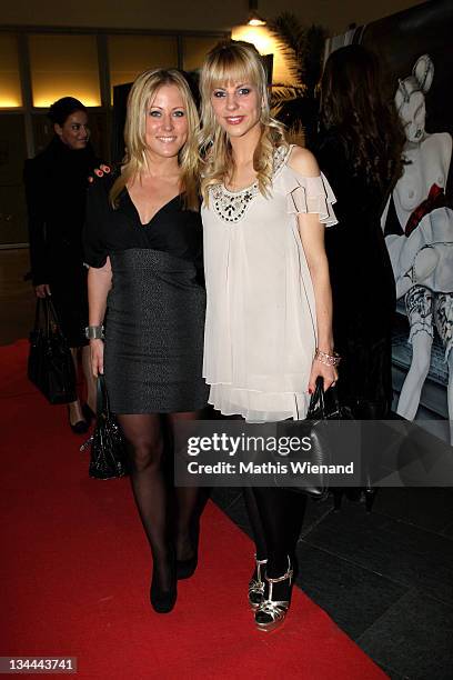 Romina Becks and her sister Jennifer attend Mila Wiegand & Kai Ebel Vernissage on December 1, 2011 in Duesseldorf, Germany.