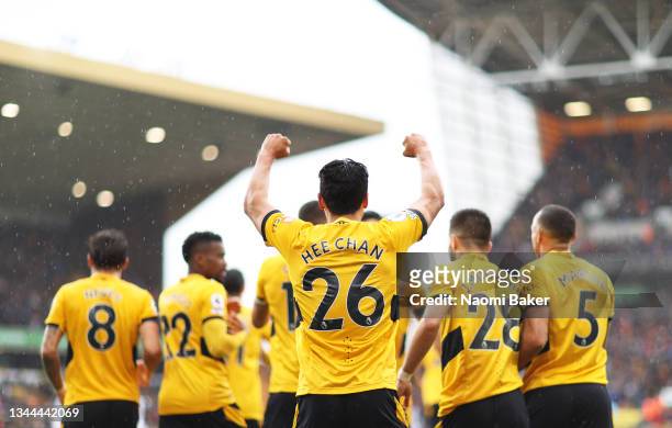 Hwang Hee-chan of Wolverhampton Wanderers celebrates after scoring their team's second goal during the Premier League match between Wolverhampton...