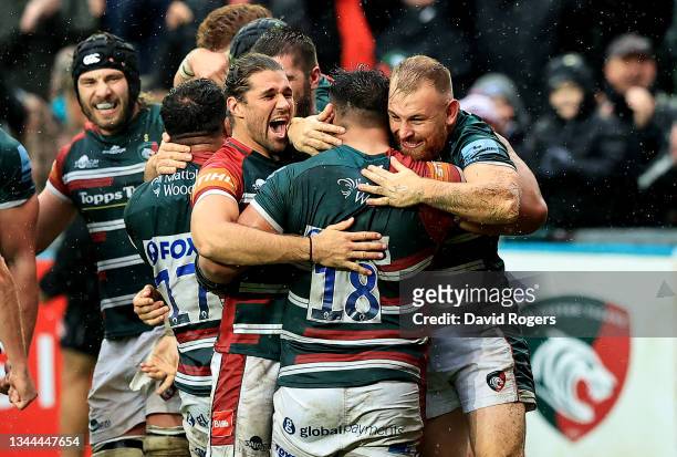 Leicester Tigers players Kobus van Wyk, Nephi Leatigaga and Tom Cowan-Dickie celebrate after being awarded a last minute, match winning penalty try...