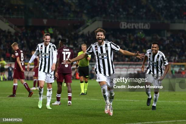 Manuel Locatelli of Juventus celebrates with team mates after scoring to give the side a 1-0 lead during the Serie A match between Torino FC v...