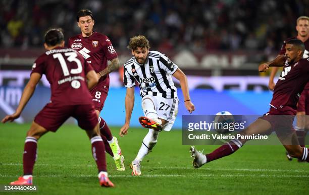 Manuel Locatelli of Juventus scores their team's first goal during the Serie A match between Torino FC v Juventus at Stadio Olimpico di Torino on...