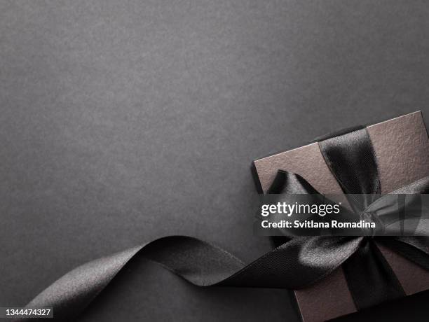 gift box - black ribbon stock pictures, royalty-free photos & images