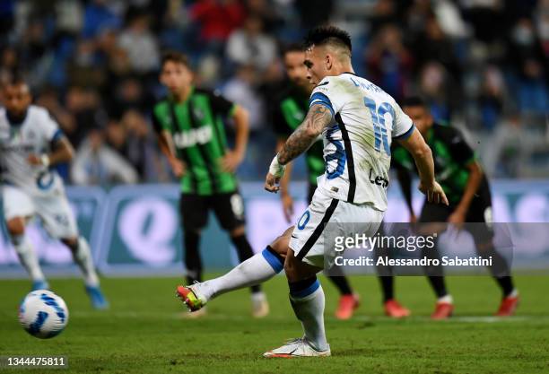 Lautaro Martinez of FC Internazionale scores their team's second goal from the penalty spot during the Serie A match between US Sassuolo v FC...