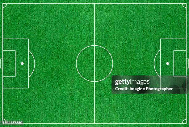 illustration, top view of a large green grass football field. - football pitch aerial stock pictures, royalty-free photos & images