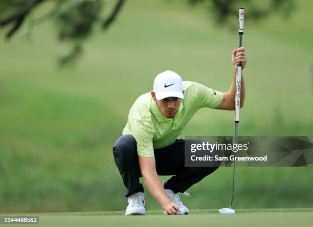 Aaron Wise lines up a putt on the first green during round three of the Sanderson Farms Championship at Country Club of Jackson on October 02, 2021...