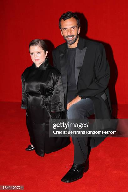 Sinead Burke and Chief Executive Officer of Balenciaga Cedric Charbit pose on the runway during the Balenciaga Womenswear Spring/Summer 2022 show as...