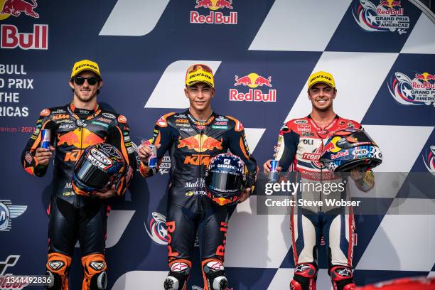 The top three Moto2 riders Raul Fernandez of Spain and Red Bull KTM Ajo , Remy Gardner of Australia and Red Bull KTM Ajo and Fabio Di Giannantonio of...