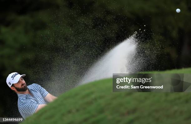 Denny McCarthy plays a shot from a bunker on the 16th hole during round three of the Sanderson Farms Championship at Country Club of Jackson on...