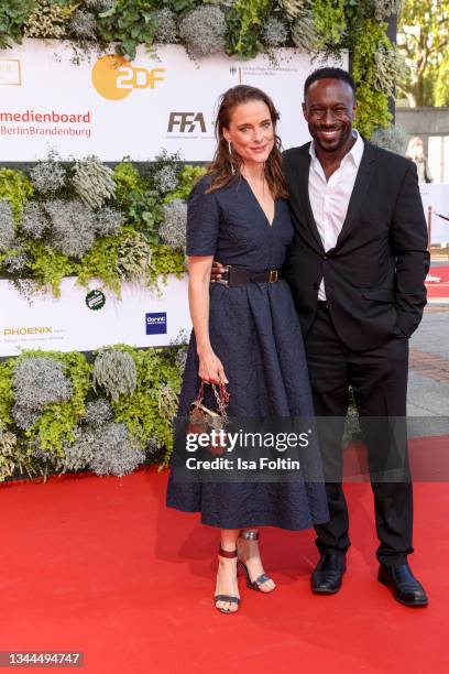 German actress Anne Ratte-Polle and German actor Jerry Kwarteng attends the Lola - German Film Award red carpet at Palais am Funkturm on October 1,...