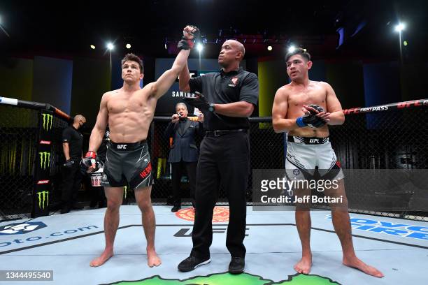 Alexander Hernandez celebrates his victory over Mike Breeden in their lightweight bout during the UFC Fight Night event at UFC APEX on October 02,...