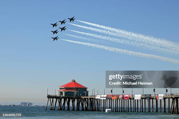 The United States Air Force Thunderbirds fly over the Huntington Beach Pier during the Pacific Airshow on October 01, 2021 in Huntington Beach,...