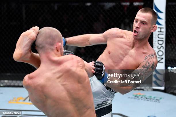 Krzysztof Jotko of Poland kicks Misha Cirkunov of Canada in their middleweight bout during the UFC Fight Night event at UFC APEX on October 02, 2021...