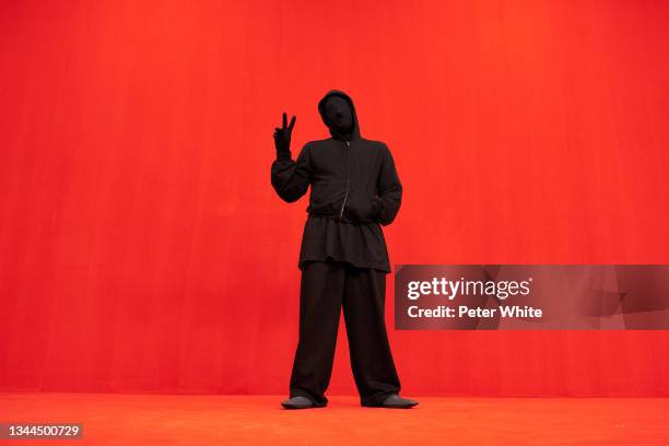 Model poses on the runway during the Balenciaga Womenswear Spring/Summer 2022 show as part of Paris Fashion Week at Theatre Du Chatelet on October...