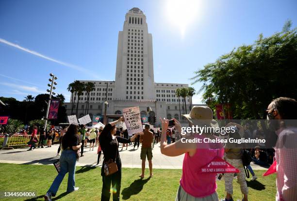 Participants are seen during Women's March Action: March 4 Reproductive Rights at Los Angeles City Hall on October 2, 2021 in Los Angeles, California.