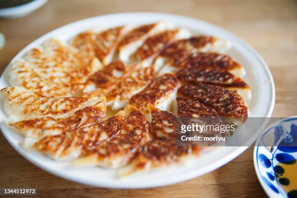 grilled gyoza - kamakura city stock pictures, royalty-free photos & images