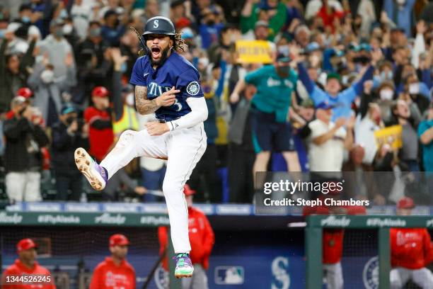 Crawford of the Seattle Mariners reacts after scoring on a single by Mitch Haniger during the eighth inning against the Los Angeles Angels at...