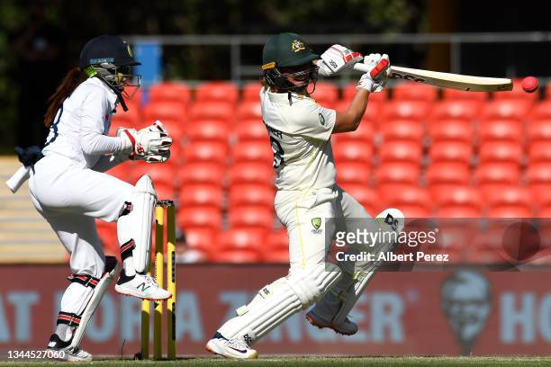 Ashleigh Gardner of Australia bats during day four of the Women's International Test Match between Australia and India at Metricon Stadium on October...